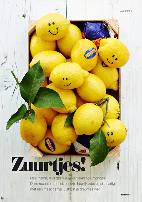 Lifestyle fotografie vrolijke citroenen in kistje