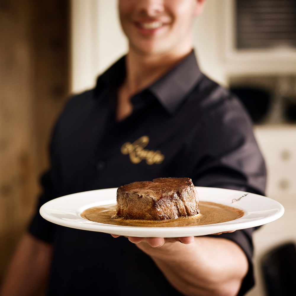 Reclamefotografie Loetje biefstuk in jus op een bord